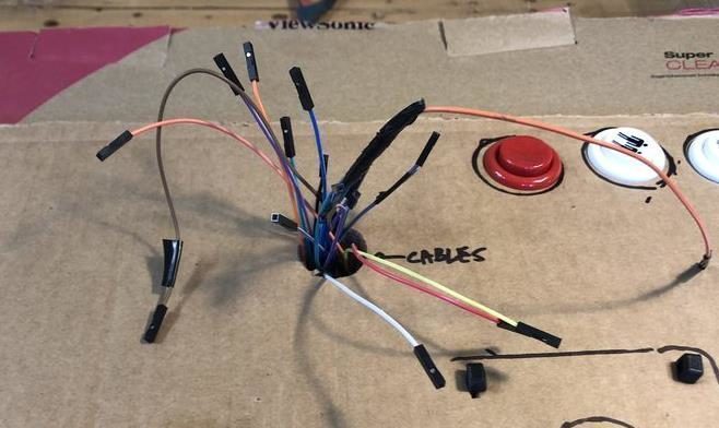 A bunch of jumper wires sticking out from the center hole on the control panel
