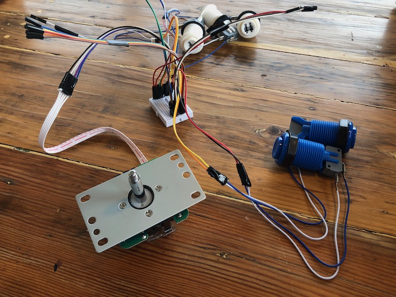 A wire harness with 5 buttons and a joystick