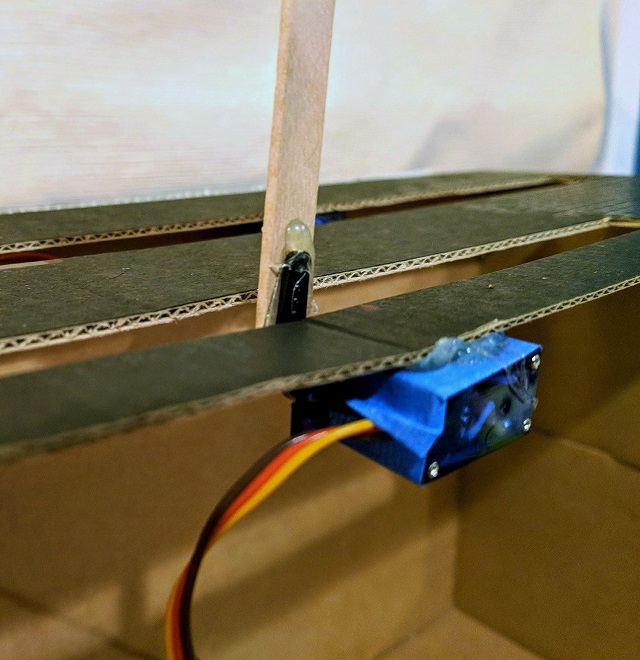 Attach the servo with masking tape