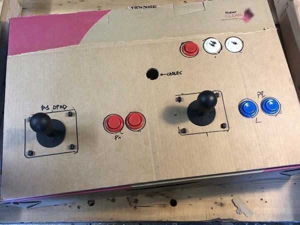 An Arcade control panel made of cardboard