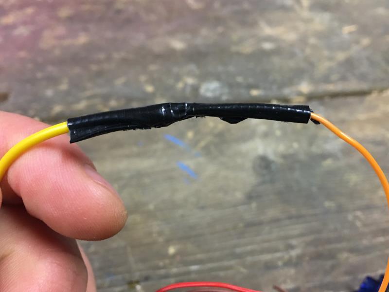 Wire connection protected with electrical tape