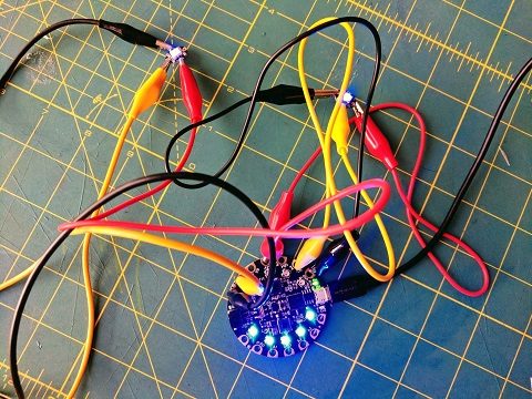 Test your lights using alligator clip wires before sewing the connections